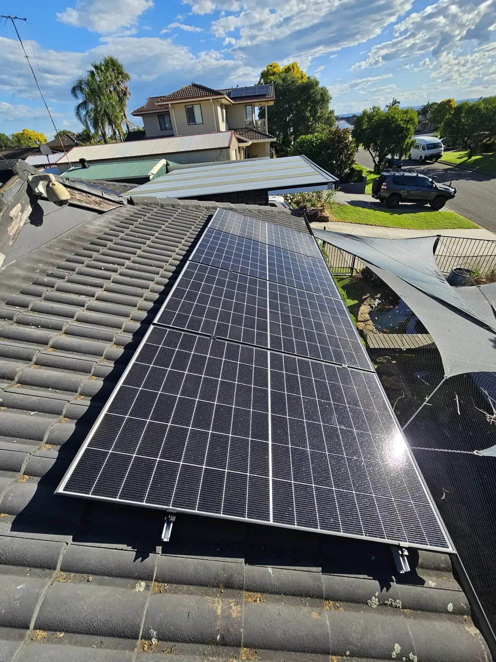 Solar panels installed on a suburban roof